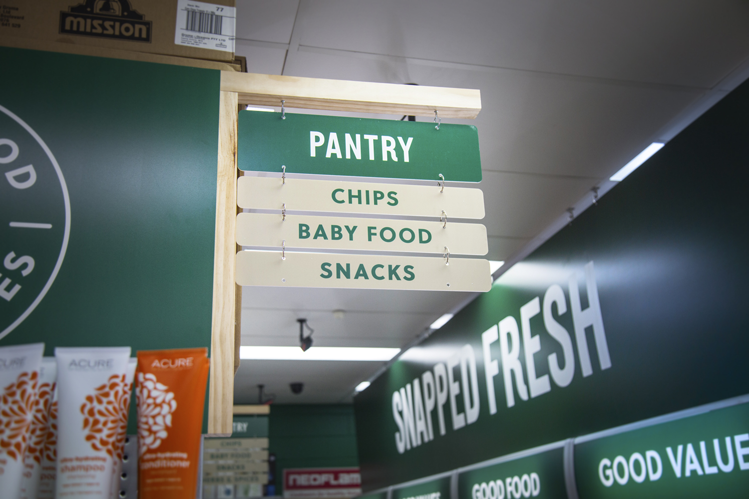 Flannery's Aisle Signage